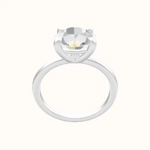 Classic Solitaire Engagement Ring With Low Set Four Prong Head