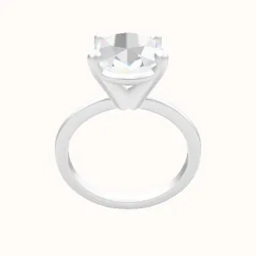 Open Solitaire Engagement Ring With High Set Four Prong Head