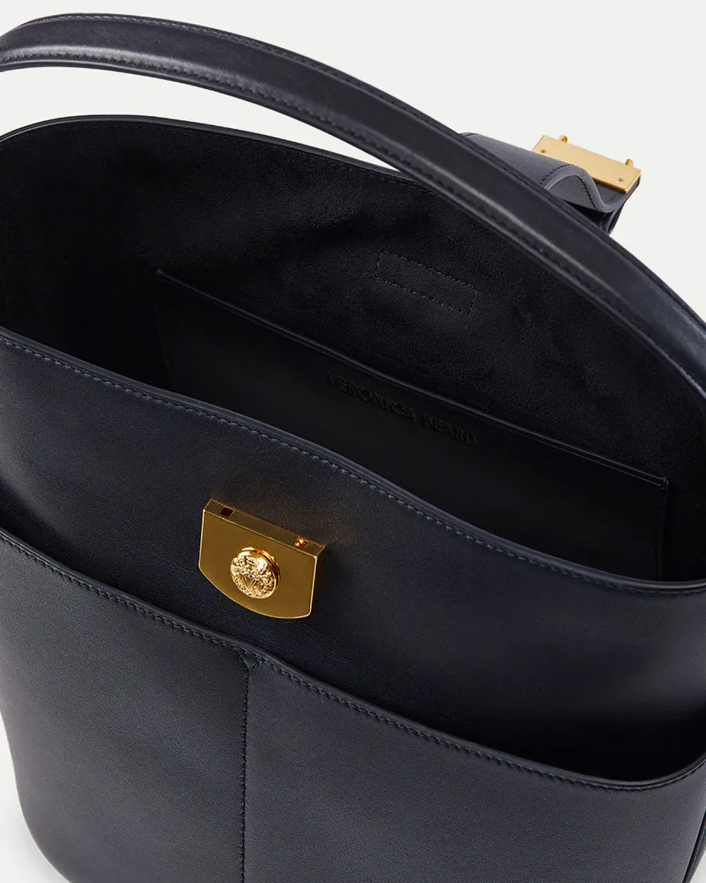 Small Crest Lock Bucket Bag in Navy